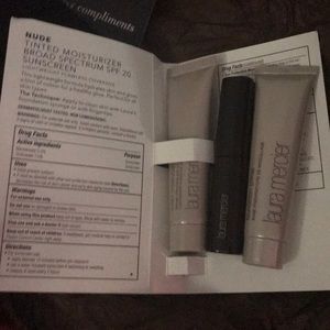 Laura Mercier bag with travel size beauty stuff